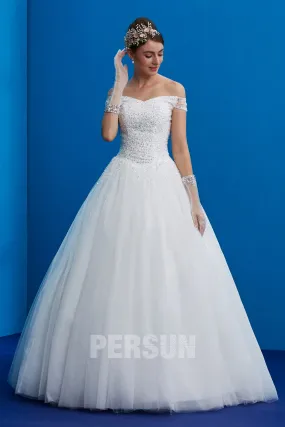 Karo : Robe de mariée princesse épaule dénudé embelli de sequins