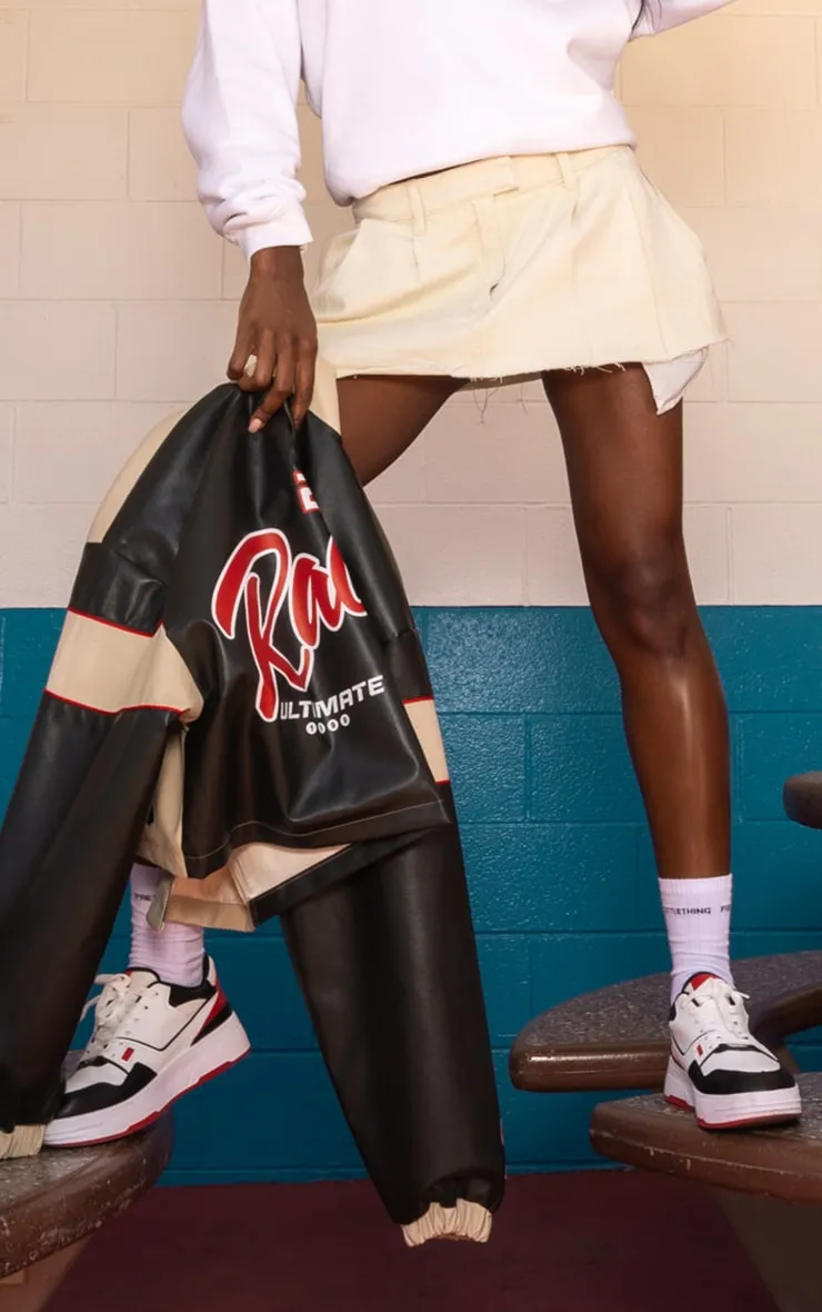 Micro jupe de tennis en jean écru à taille basse