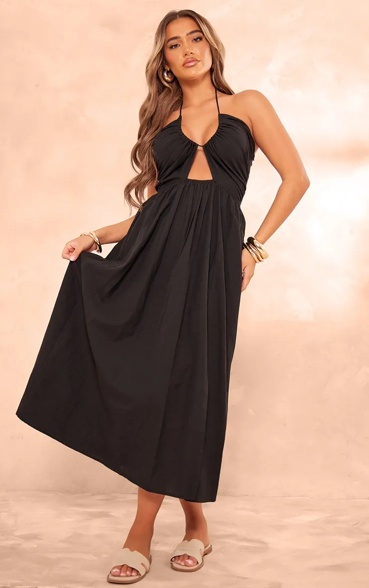 Robe longue effet lin noire à dos nu et décolleté plongeant