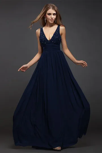 Robe longue pour aller un mariage décolletée V plongeant à paillettes dos découpé