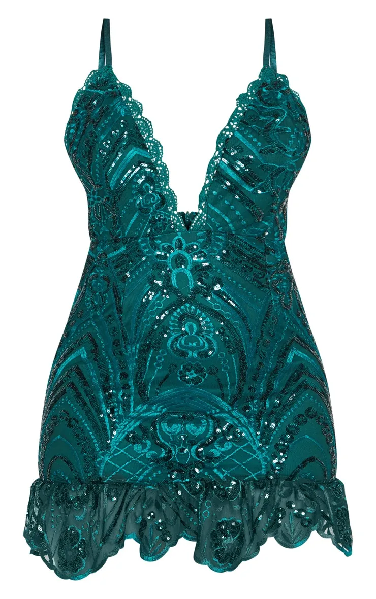 Robe moulante vert émeraude à sequins et ourlet dentelle volanté