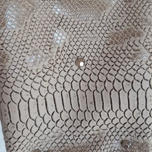 Sac seau en simili serpent beige,fait main, modèle calypso de sacôtin